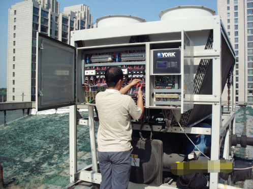 北京中央空調螺桿風冷機組的維修、調試-圖1